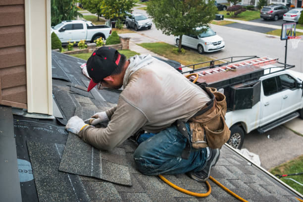 Professional Emergency Roof Repair technician working in DeWitt, IA